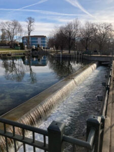 Picture taken in April this year showing the spillway without the boat slips. It is much more attractive. We are trying to persuade the city not to replace the slips.