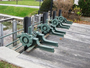 Gates at the mill race that can be raised to allow water to flow into the White River thereby controlling the level of the lake.